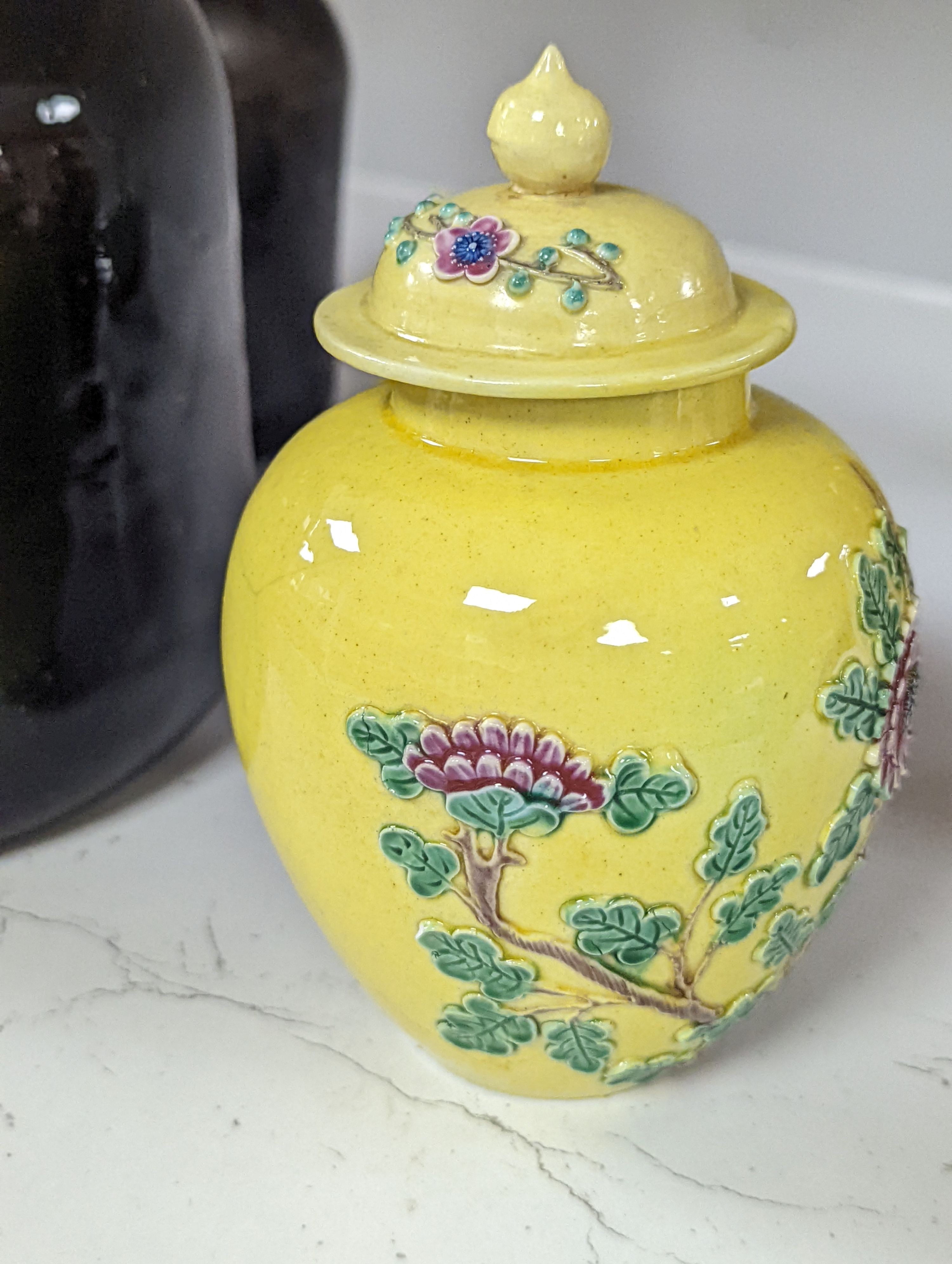 A Chinese enamelled yellow-ground jar and cover, a pottery teapot and cover and a flambe vase, latter 13cm